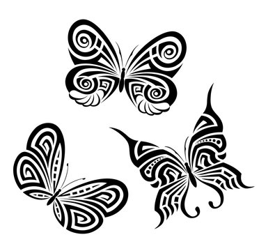 Set of black and white butterflies in the form of a tribal tattoo 