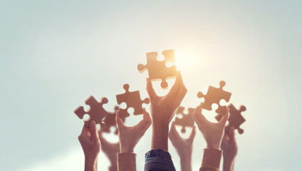 Teamwork of partners. Coworking and business partnership concept. Businessmen and businesswomen...
