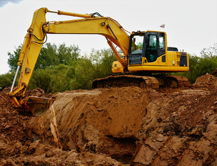 excavator digging ground construction