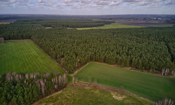Cultural landscape in the north of Germany with forests, meadows and fields, aerial view with the drone