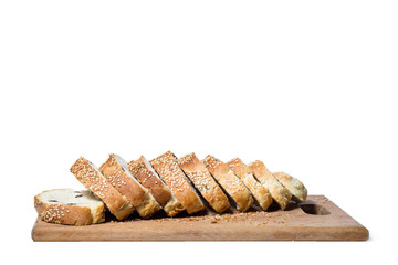 White bread with sesame sliced on a board