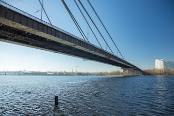 North bridge over the Dnieper river in Kiev in early spring on a sunny morning.