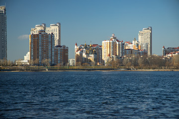 Fototapeta na wymiar Housing estate on the opposite side of the river.