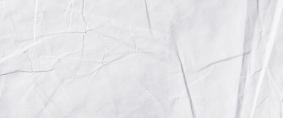 Creative background with scattered overlay of crumpled papers.