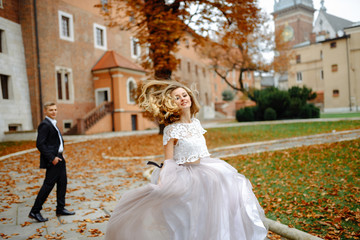 Obraz premium Two lovers walk along Krakow