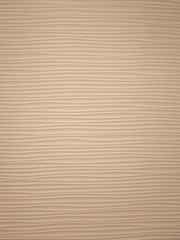Wavy blue stripes. The texture in the form of sand dunes. vertical background.