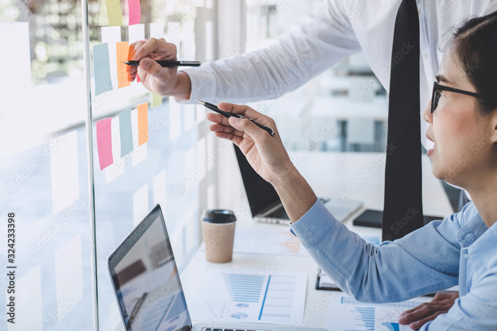 Poster teamwork of business team consulting market growth on financial document graph report statistics, us