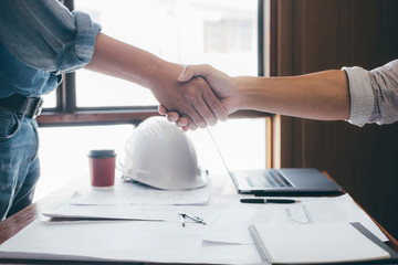 Meeting and greeting, Two engineer or architect meeting for project, handshake after consultation...