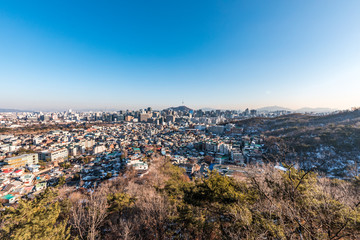 Fototapeta na wymiar 인왕산에서 바라본 서울 도심 낮 풍경과 밤 (야경) 뷰 Seoul Day and Night Skyline from Inwangsan Mountain