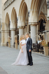 Obraz premium Two lovers walk along Krakow