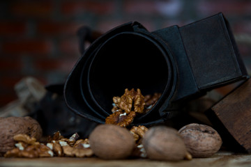 Walnuts on Rustic Old Table with Vintage Hand Grinder