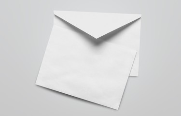 Blank card and white envelope on the desk