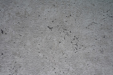 Gray interior wall.  Space for text, logos