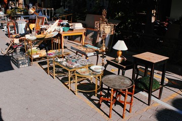 Souvenirs and vintage items on a stall at street market in Athens. Greece