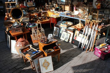 Souvenirs and vintage items on a stall at street market in Athens. Greece
