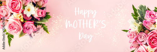 Happy Mothers Day words. Beautiful and tender bouquet of flowers in the hat box, nice present concept, banner size