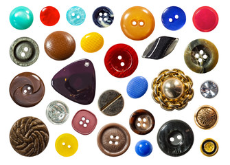 Set of various old sew-through cloth buttons isolated on the white