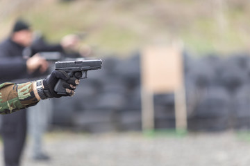 police, army and border police gun training. firing weapons and pistols. gun shooting exercise. detailed shots of gun, bullets and shells.