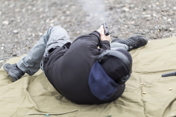 police, army and border police gun training. firing weapons and pistols. gun shooting exercise. detailed shots of gun, bullets and shells.