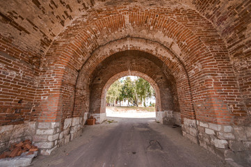 The red brick wall of the old Kremlin military fortress in the city of Zaraysk