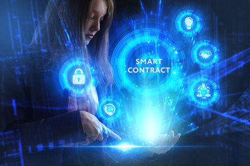 Fototapeta premium Business, Technology, Internet and network concept. Young businessman working on a virtual screen of the future and sees the inscription: Smart contract