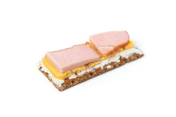 Crisp bread with cheese and sausage isolated on white background.