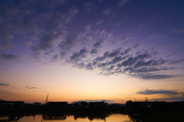Beautiful and amazing nature sunrise sky with clouds .