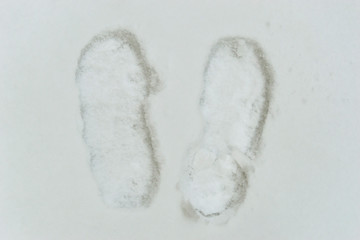 footprints from shoes, feet in the snow