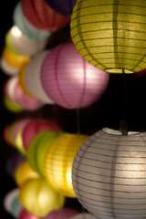 Brightly Colored Festive Paper Lanterns Glowing at Night