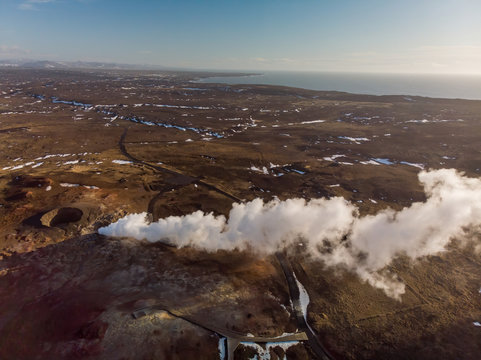 Aerial view of steam cloud of hot sulfur spring in Iceland 