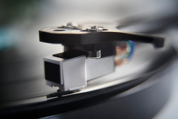 Close up of Vinyl record player needle on turntable