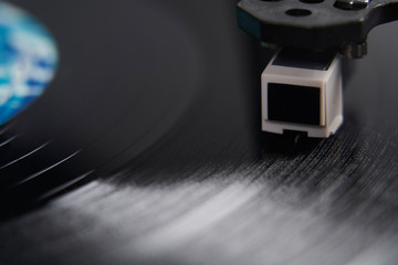 Close up of Vinyl record player needle on turntable