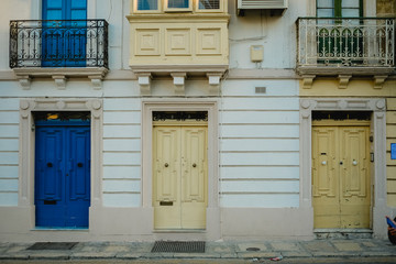 Obraz na płótnie Canvas colourful windows and doors