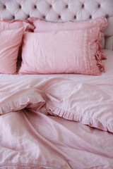 beautiful pink bed with ruffles and lace