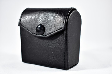Fototapeta premium black leather purse isolated on white background