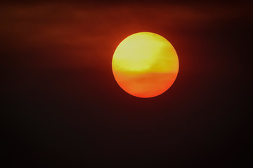 Orange sunset with clouds, in Pampas province, Argentina