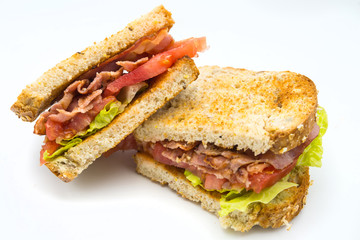Fototapeta A BLT is a type of sandwich, named for the initials of its primary ingredients, bacon, lettuce and tomato obraz