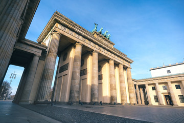 The famous Brandenburg Gate in Berlin in front of a clear blue sky