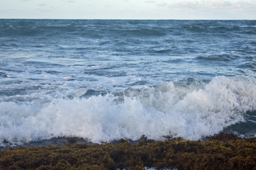 waves crashing on rocks