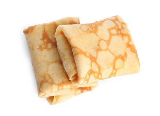 Folded fresh thin pancakes isolated on white