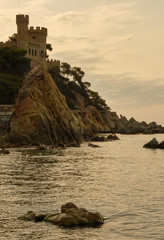 Castle on a cliff with the sea and rocks in the background, Girona