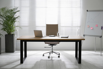 Director's office with large wooden table. Interior design