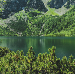 Fototapeta na wymiar The lake Morskie Oko or Eye of the Sea. Western Carpathian mountains. The Tatra National Park in the Rybi Potok (the Fish Brook) Valley, Zakopane, Poland.
