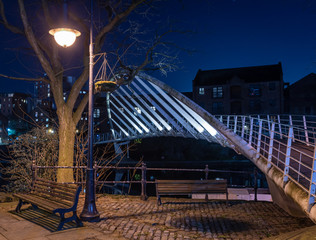 Bridge over water at night