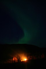 Fototapeta na wymiar Aurora Borealis over the fire