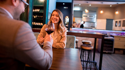 Young couple enjoying lunch in the restaurant