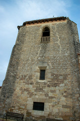 Fototapeta na wymiar Campanario de piedra de una iglesia.