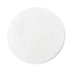 Cotton pad on a white background. Top view