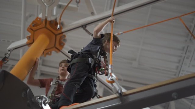 Little Boys On Indoor Obstacle Course 