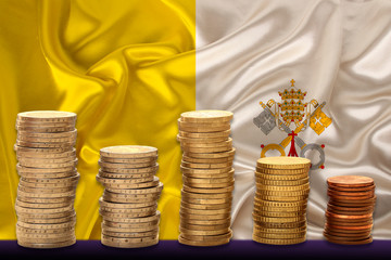 stacks of euro currency coins against the silk flag of the Vatican country, the concept of...
